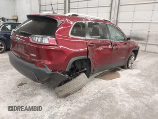 2019 Jeep Cherokee Latitude Plus with VIN 1C4PJMLX0KD185576, listed as a IAAI auction lot 40929611 with 105,546 mi miles and . Bid and sale history available at DreamBid. Image 4.