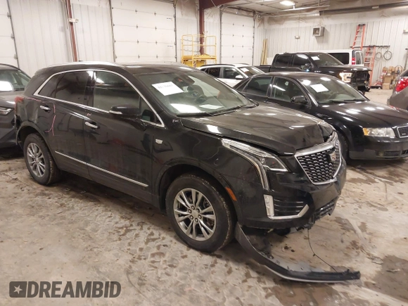 2023 Cadillac XT5 AWD Premium Luxury with VIN 1GYKNDR48PZ186751, listed as a IAAI auction lot 41526667 with 35,690 mi miles and . Bid and sale history available at DreamBid. Image 1.
