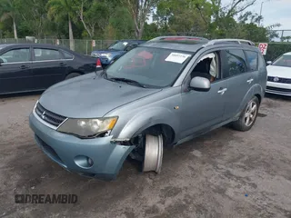 2007 Mitsubishi Outlander XLS z VIN JA4MS41X57Z016273, wystawiony jako IAAI lot #38897236 z przebiegiem 165 376 mil mil oraz . Historia ofert i sprzedaży dostępna na DreamBid. Obrazek 2.
