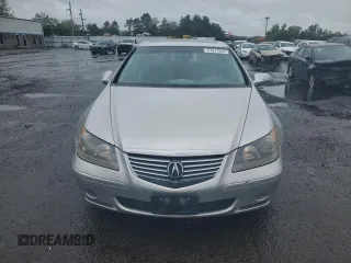 2006 Acura RL z VIN JH4KB16526C005279, wystawiony jako Copart lot #57917835 z przebiegiem 145 737 mil mil oraz Szkody całkowita. Historia ofert i sprzedaży dostępna na DreamBid. Obrazek 5.