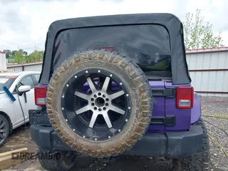 2018 Jeep Wrangler Unlimited Sport S with VIN 1C4BJWDG6JL882596, listed as a IAAI auction lot 42099289 with 121,714 mi miles and . Bid and sale history available at DreamBid. Image 16.