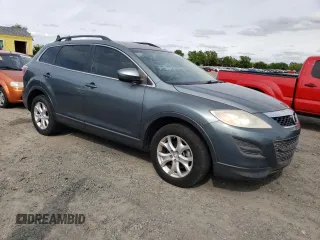 2011 Mazda CX-9 Sport with VIN JM3TB3BA9B0313914, listed as a Copart auction lot 52218805 with 132,160 mi miles and Clean Title. Bid and sale history available at DreamBid. Image 4.