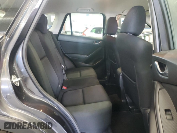 2015 Mazda CX-5 Sport z VIN JM3KE2BE6F0473738, wystawiony jako Copart lot #58718185 z przebiegiem 90 862 mil mil oraz Czysty tytuł • Clean title. Historia ofert i sprzedaży dostępna na DreamBid. Obrazek 10.
