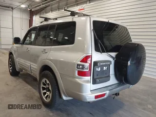 2002 Mitsubishi Montero Limited z VIN JA4MW51RX2J048087, wystawiony jako IAAI lot #42096678 z przebiegiem 218 795 mil mil oraz . Historia ofert i sprzedaży dostępna na DreamBid. Obrazek 3.