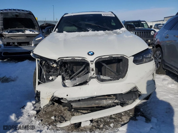 2022 BMW X4 M with VIN 5YM23EC04N9K50909, listed as a Copart auction lot 87947765 with 27474 miles and Salvage Title. Bid and sale history available at carsss.com. Image 5.