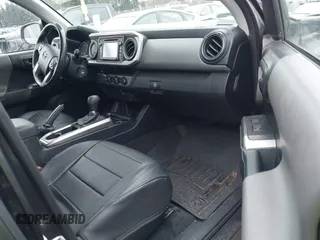 2017 Toyota Tacoma SR5 with VIN 3TMAZ5CN5HM038170, listed as a IAAI auction lot 41588399 with 152,469 mi miles. Bid and sale history available at carsss.com. Image 5.