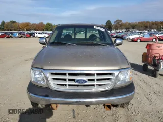 1999 Ford F-150 XL с VIN 1FTRF17L2XKA36749, выставлен на аукционе Copart как лот 84671444 с пробегом 148 338 миль миль и Списание • Salvage title. История ставок и продаж доступна на DreamBid. Изображение 5.