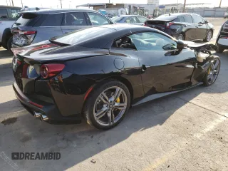 2020 Ferrari Portofino z VIN ZFF89FPA7L0256197, wystawiony jako Copart lot #65969664 z przebiegiem Nie podano mil oraz Szkody całkowita. Historia ofert i sprzedaży dostępna na DreamBid. Obrazek 3.