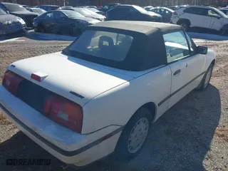 1991 Mercury Capri with VIN 6MPCT01ZXM8607170, listed as a IAAI auction lot 41453641 with 40,731 mi miles. Bid and sale history available at carsss.com. Image 4.