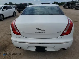 2015 Jaguar XJ with VIN SAJWA1CZ9F8V82974, listed as a Copart auction lot 59364344 with 64,012 mi miles and Salvage Title. Bid and sale history available at carsss.com. Image 6.
