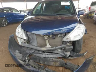 2012 Nissan Versa S z VIN 3N1BC1CPXCK258122, wystawiony jako IAAI lot #42164469 z przebiegiem 64 594 mil mil oraz . Historia ofert i sprzedaży dostępna na DreamBid. Obrazek 12.