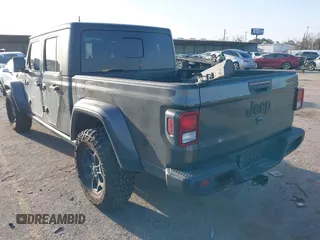 2022 Jeep Gladiator Texas Trail with VIN 1C6HJTAG7NL151184, listed as a IAAI auction lot 41614573 with 50,169 mi miles. Bid and sale history available at carsss.com. Image 3.