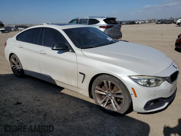 2015 BMW 4 Series 428i with VIN WBA4A5C5XFD410290, listed as a Copart auction lot 49067335 with 165,283 mi miles and Clean Title. Bid and sale history available at DreamBid. Image 4.