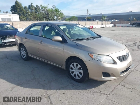 2009 Toyota Corolla with VIN 1NXBU40EX9Z065469, listed as a IAAI auction lot 42022537 with 179,819 mi miles. Bid and sale history available at carsss.com. Image 1.
