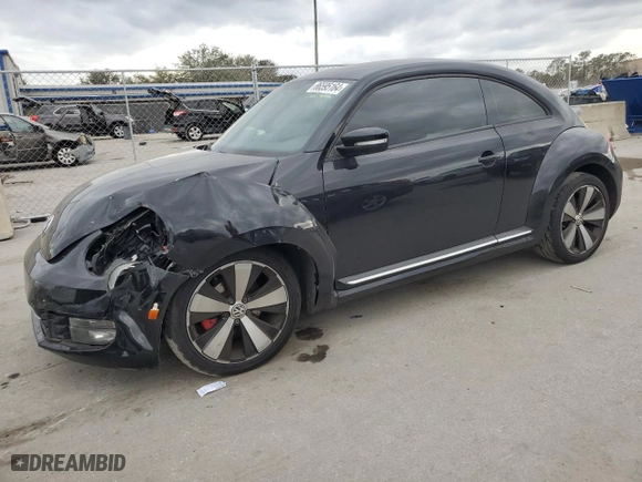 2012 Volkswagen Beetle 2.0T Turbo w/Sun/Sound with VIN 3VWV67AT2CM664806, listed as a Copart auction lot 86595164 with 158,239 mi miles and Salvage Title. Bid and sale history available at carsss.com. Image 1.
