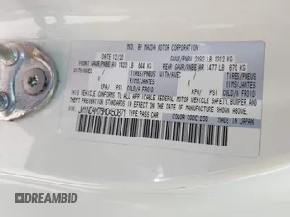 2021 Mazda MX-5 Miata Grand Touring z VIN JM1NDAM75M0450871, wystawiony jako IAAI lot #42060495 z przebiegiem 48 670 mil mil oraz . Historia ofert i sprzedaży dostępna na DreamBid. Obrazek 9.