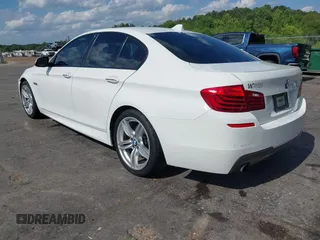 2015 BMW 5 Series 535i with VIN WBA5B1C59FG125069, listed as a IAAI auction lot 42210708 with 265,298 mi miles and . Bid and sale history available at DreamBid. Image 3.