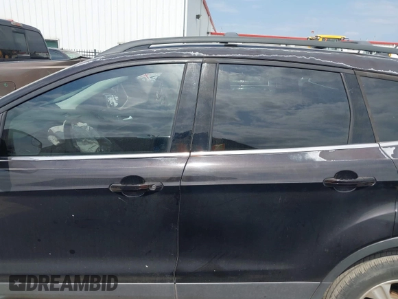 2013 Ford Escape SE with VIN 1FMCU0G96DUC34594, listed as a IAAI auction lot 42040437 with 161,847 mi miles and . Bid and sale history available at DreamBid. Image 14.