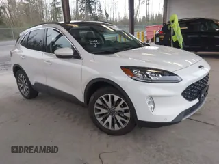 2020 Ford Escape Titanium Hybrid z VIN 1FMCU9DZ8LUA58350, wystawiony jako IAAI lot #41975564 z przebiegiem 38 387 mil mil oraz . Historia ofert i sprzedaży dostępna na DreamBid. Obrazek 1.