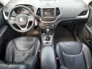 2014 Jeep Cherokee Trailhawk with VIN 1C4PJMBS9EW159993, listed as a Copart auction lot 46935105 with 128,140 mi miles and Salvage Title. Bid and sale history available at carsss.com. Image 8.