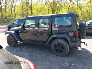 2012 Jeep Wrangler Unlimited Sport z VIN 1C4BJWDG1CL220511, wystawiony jako IAAI lot #42227037 z przebiegiem 157 914 mil mil oraz . Historia ofert i sprzedaży dostępna na DreamBid. Obrazek 14.