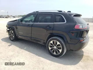 2019 Jeep Cherokee z VIN 1C4PJLJN0KD215834, wystawiony jako Copart lot #57652975 z przebiegiem 127 986 mil mil oraz Czysty tytuł • Clean title. Historia ofert i sprzedaży dostępna na DreamBid. Obrazek 2.