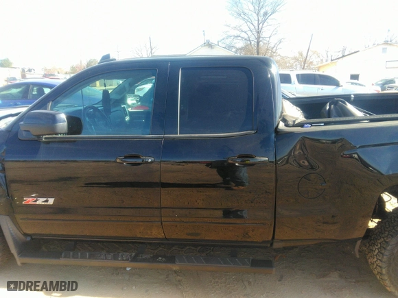 2018 Chevrolet Silverado 1500 LT with VIN 1GCVKREC9JZ256948, listed as a IAAI auction lot 41828882 with 63,209 mi miles. Bid and sale history available at carsss.com. Image 14.