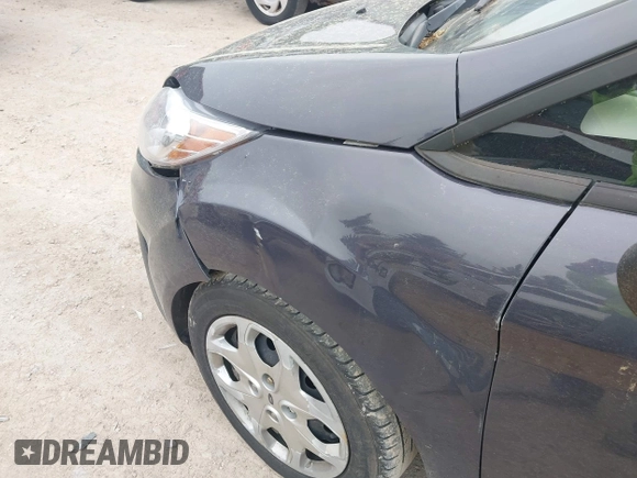 2013 Ford Fiesta S z VIN 3FADP4AJ9DM175576, wystawiony jako IAAI lot #42449969 z przebiegiem 123 959 mil mil oraz . Historia ofert i sprzedaży dostępna na DreamBid. Obrazek 13.