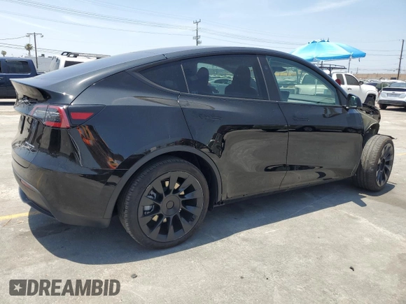 2024 Tesla Model Y Long Range with VIN 7SAYGDEEXRA253111, listed as a Copart auction lot 60929295 with 16,423 mi miles and Salvage title. Bid and sale history available at DreamBid. Image 3.