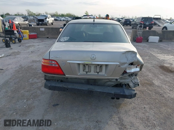 2002 Acura RL with VIN JH4KA96552C008589, listed as a IAAI auction lot 41860930 with 210,847 mi miles and . Bid and sale history available at DreamBid. Image 17.