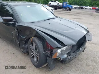 2014 Dodge Charger RT Plus with VIN 2C3CDXDT6EH187041, listed as a IAAI auction lot 39443589 with 62,981 mi miles. Bid and sale history available at carsss.com. Image 6.