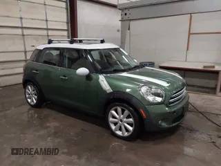 2015 MINI Countryman with VIN WMWZB3C50FWR43714, listed as a IAAI auction lot 41589778 with 93,404 mi miles and . Bid and sale history available at DreamBid. Image 1.