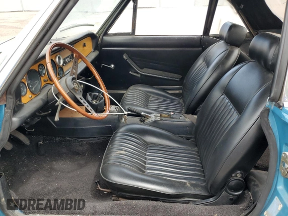 1974 FIAT 124 Spider z VIN 124CS10081683, wystawiony jako Copart lot #58650195 z przebiegiem 143 647 mil mil oraz Czysty tytuł • Clean title. Historia ofert i sprzedaży dostępna na DreamBid. Obrazek 7.