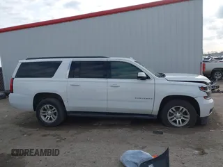2015 Chevrolet Suburban LT with VIN 1GNSCJKC9FR702598, listed as a IAAI auction lot 41909771 with 150,206 mi miles and . Bid and sale history available at DreamBid. Image 13.