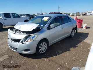 2009 Toyota Yaris with VIN JTDBT903491323280, listed as a IAAI auction lot 41770221 with 315,030 mi miles. Bid and sale history available at carsss.com. Image 2.