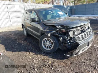 2018 Jeep Grand Cherokee Laredo E with VIN 1C4RJFAG4JC326631, listed as a IAAI auction lot 41191061 with 115,451 mi miles. Bid and sale history available at carsss.com. Image 1.