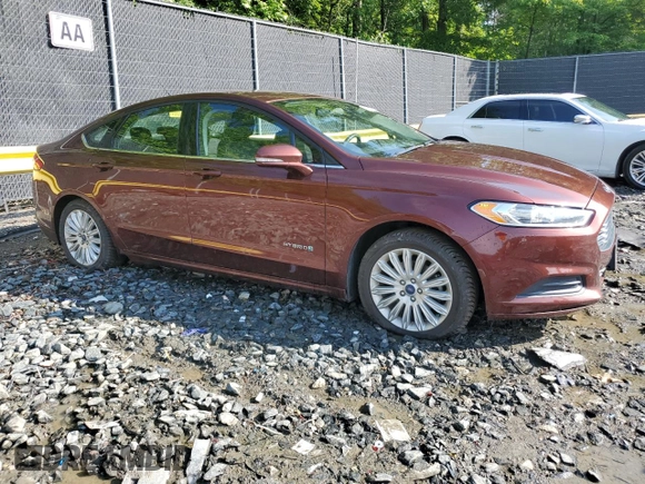 2016 Ford Fusion SE Hybrid z VIN 3FA6P0LU5GR377735, wystawiony jako Copart lot #58791955 z przebiegiem 135 798 mil mil oraz Szkoda całkowita • Salvage title. Historia ofert i sprzedaży dostępna na DreamBid. Obrazek 4.