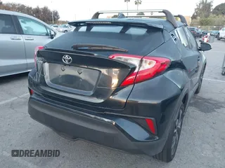 2019 Toyota C-HR XLE with VIN JTNKHMBXXK1034717, listed as a IAAI auction lot 41939078 with 56,309 mi miles. Bid and sale history available at carsss.com. Image 4.