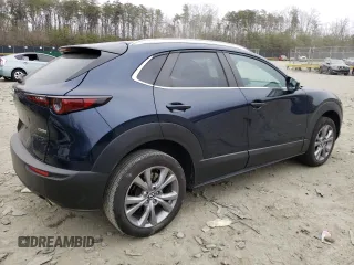 2023 Mazda CX-30 S Carbon Edition with VIN 3MVDMBCM5PM507711, listed as a Copart auction lot 48982325 with 42,759 mi miles and Salvage Title. Bid and sale history available at carsss.com. Image 3.
