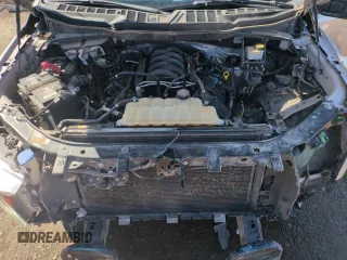 2021 Ford F-150 XL with VIN 1FTMF1C50MKD81601, listed as a Copart auction lot 49331765 with 65,702 mi miles and Salvage title. Bid and sale history available at DreamBid. Image 11.