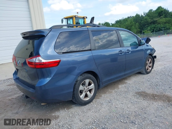 2015 Toyota Sienna LE AAS with VIN 5TDKK3DCXFS624984, listed as a IAAI auction lot 42560632 with 169,034 mi miles and . Bid and sale history available at DreamBid. Image 4.