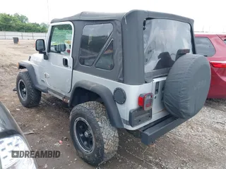2004 Jeep Wrangler Sport with VIN 1J4FA49S44P772575, listed as a IAAI auction lot 42512876 with 226,387 mi miles and . Bid and sale history available at DreamBid. Image 3.
