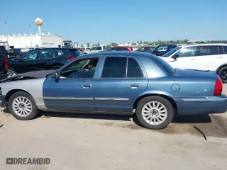 2009 Mercury Grand Marquis LS with VIN 2MEHM75V09X634393, listed as a IAAI auction lot 41993456 with 153,862 mi miles. Bid and sale history available at carsss.com. Image 14.