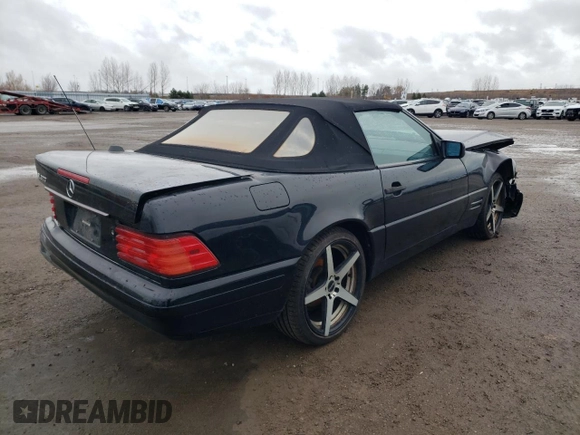 1997 Mercedes-Benz SL 500 z VIN WDBFA63F5VF145337, wystawiony jako Copart lot #79991204 z przebiegiem 134 424 mil mil oraz Szkoda całkowita • Salvage title. Historia ofert i sprzedaży dostępna na DreamBid. Obrazek 3.