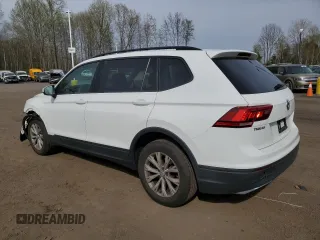 2019 Volkswagen Tiguan S with VIN 3VV0B7AX7KM106090, listed as a Copart auction lot 54771435 with 101,711 mi miles and Salvage title. Bid and sale history available at DreamBid. Image 2.