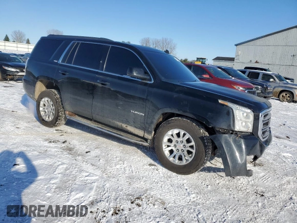 2015 GMC Yukon SLE with VIN 1GKS2AKC0FR267745, listed as a Copart auction lot 84876234 with 145,716 mi miles and Clean Title. Bid and sale history available at carsss.com. Image 4.