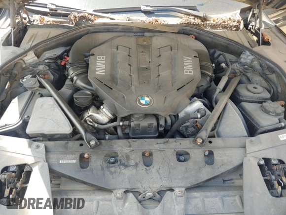 2012 BMW 7 Series 750Li xDrive z VIN WBAKC8C58CC435970, wystawiony jako Copart lot #53962815 z przebiegiem 129 273 mil mil oraz Czysty tytuł • Clean title. Historia ofert i sprzedaży dostępna na DreamBid. Obrazek 7.