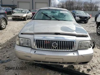 2007 Mercury Grand Marquis LS z VIN 2MEFM75V77X639871, wystawiony jako Copart lot #51816205 z przebiegiem 207 440 mil mil oraz Tytuł czysty. Historia ofert i sprzedaży dostępna na DreamBid. Obrazek 5.