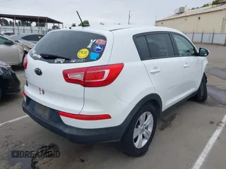 2013 Kia Sportage LX with VIN KNDPBCA21D7356092, listed as a IAAI auction lot 42111086 with 102,521 mi miles and . Bid and sale history available at carsss.com. Image 4.