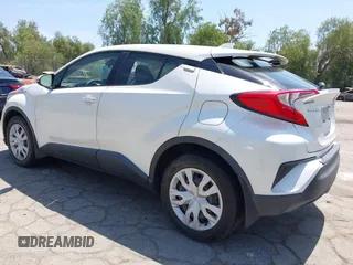 2020 Toyota C-HR LE with VIN JTNKHMBX3L1074882, listed as a IAAI auction lot 42064899 with 44,897 mi miles and . Bid and sale history available at DreamBid. Image 3.